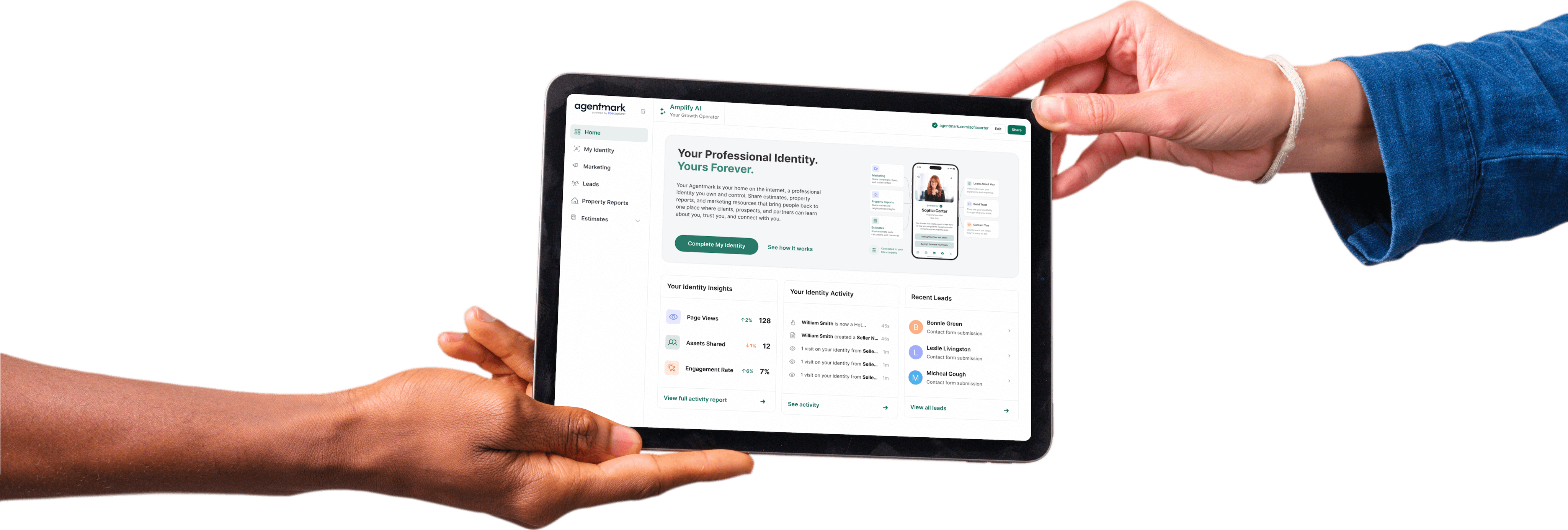 Two people passing a tablet showing an Agentmark Amplify AI dashboard